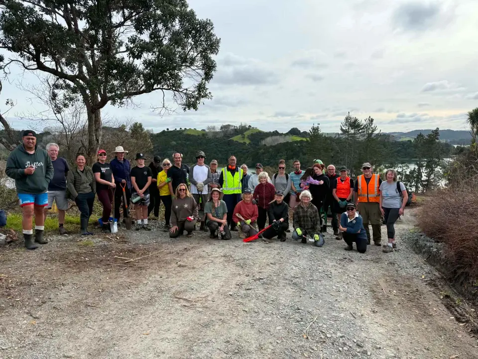 Volunteers gathered at Huawai Bay